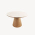 Mesa comedor fija circular Nora, diseño lujo contemporáneo, tapa porcelánico blanco veteado, base troncocónica madera roble natural.