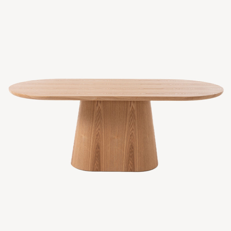 Mesa fija Savia de diseño orgánico, tapa ovalada y base troncocónica en madera de roble natural. Ideal para comedor moderno, nórdico o rústico.
