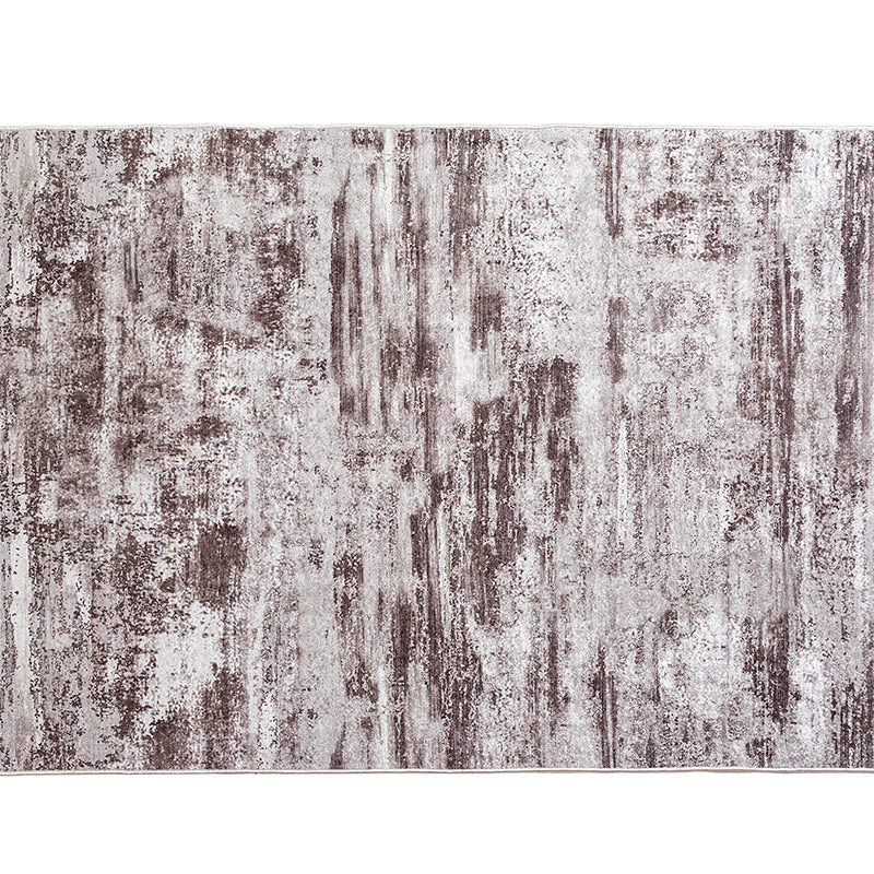 Alfombra Brooklyn, estilo industrial/urbano. Textura cemento, tonos grises/tierra, 100% PES, 1200 GSM, antideslizante. Medidas 130x190/180x300 cm.